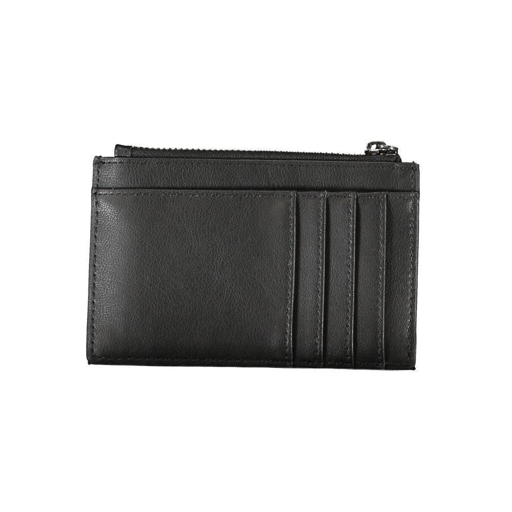 Sleek Black Zip Wallet with Contrast DetailingDiscover sophistication with this sleek black wallet from Calvin Klein, a statement piece with practical elegance. Designed with two external pockets for easy access and a secure zip closure to keep your valua