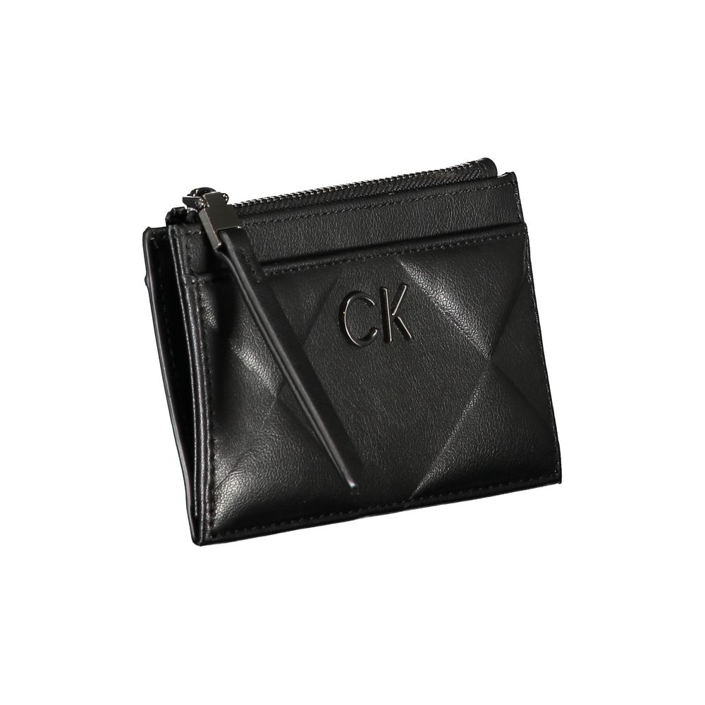 Sleek Black Zip Wallet with Contrast DetailingDiscover sophistication with this sleek black wallet from Calvin Klein, a statement piece with practical elegance. Designed with two external pockets for easy access and a secure zip closure to keep your valua