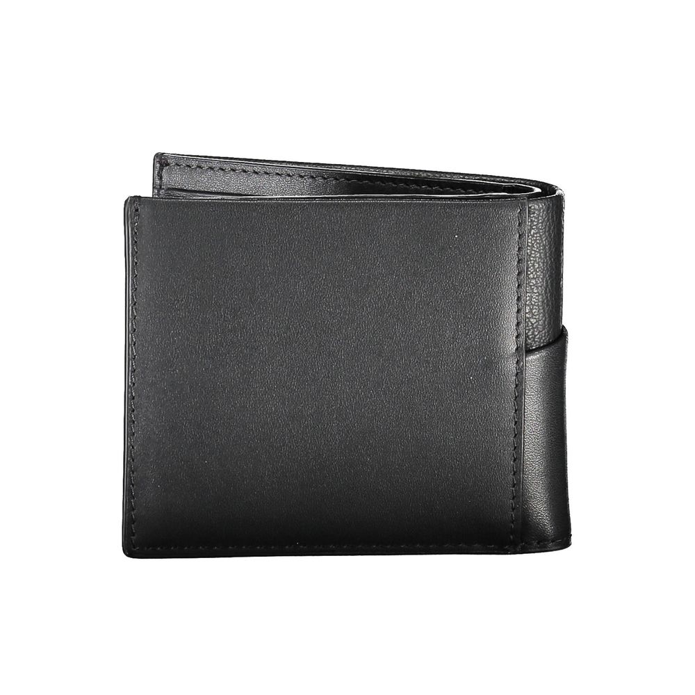 Sleek Leather Bifold Wallet with RFID BlockingRefined style meets practicality in this premium leather wallet from Calvin Klein. Designed with modern security and classic elegance in mind, it features two main compartments, a coin purse, ample space for y