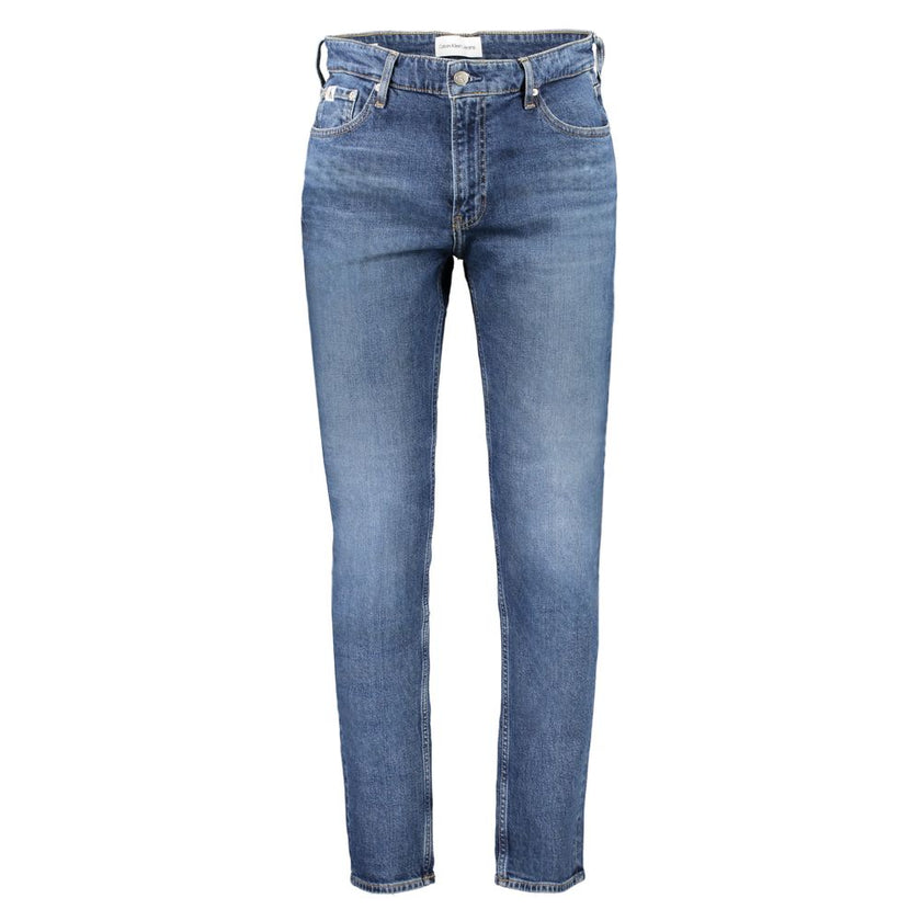 Blue Cotton Men JeansElevate your denim repertoire with the quintessence of contemporary style—Calvin Klein’s DAD JEANS. These authentic jeans boast a classic 5-pocket design infused with a modern washed effect, ensuring you stand out in any crowd. Crafte