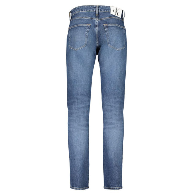 Blue Cotton Men JeansElevate your denim repertoire with the quintessence of contemporary style—Calvin Klein’s DAD JEANS. These authentic jeans boast a classic 5-pocket design infused with a modern washed effect, ensuring you stand out in any crowd. Crafte