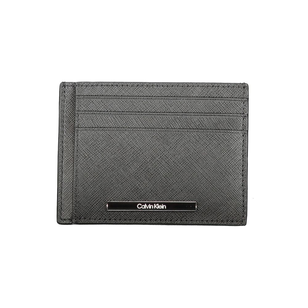 Black Leather WalletCARD HOLDER, 1 CENTRAL POCKET, 1 COMPARTMENT, DOUBLE SPACES FOR CARDS, CONTRAST DETAILS, LOGOBlack Leather Wallet${tagsCalvin KleinAulae Black Leather Wallet Calvin KleinAulae Black Leather Wallet CARD HOLDER, 1 CENTRAL POCKET, 1 COMPA