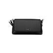 Black Polyester Women HandbagIndulge in the epitome of sophistication with Calvin Klein’s handbag, where functionality meets high fashion. This exquisite piece brings an air of exclusive elegance to your arm. It’s crafted with a blend of polyester and pol