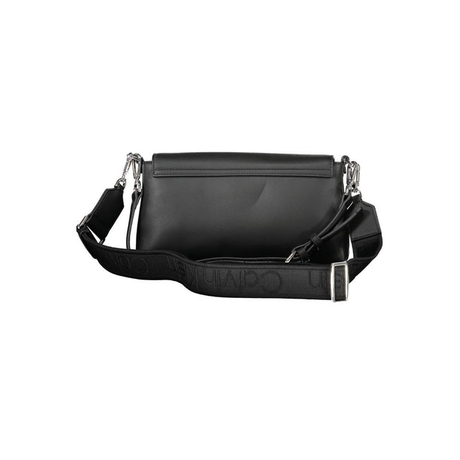 Black Polyester Women HandbagIndulge in the epitome of sophistication with Calvin Klein’s handbag, where functionality meets high fashion. This exquisite piece brings an air of exclusive elegance to your arm. It’s crafted with a blend of polyester and pol