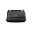 Black Polyethylene Women HandbagExperience the pinnacle of urban elegance with Calvin Klein’s latest handbag masterpiece. Showcasing a sleek black 100% polyethylene composition, this accessory is the epitome of chic sophistication with a practical edge. T
