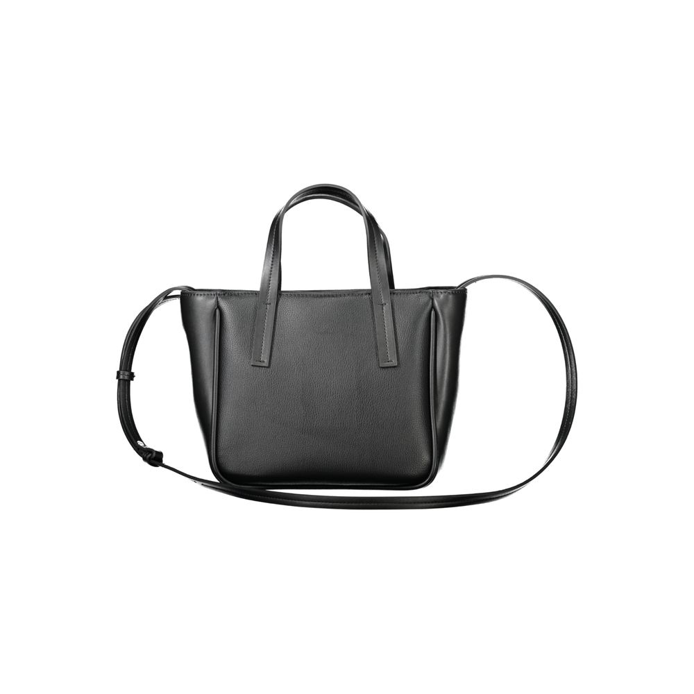 Black Polyethylene Women HandbagElevate your accessory game with this sleek Calvin Klein handbag, a statement piece blending utility and style. Crafted with a modern mixture of 33% Polyester and 67% Polyethylene, this exquisite black bag boasts two handle