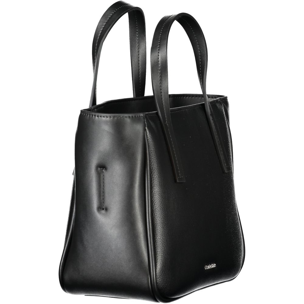 Black Polyethylene Women HandbagElevate your accessory game with this sleek Calvin Klein handbag, a statement piece blending utility and style. Crafted with a modern mixture of 33% Polyester and 67% Polyethylene, this exquisite black bag boasts two handle