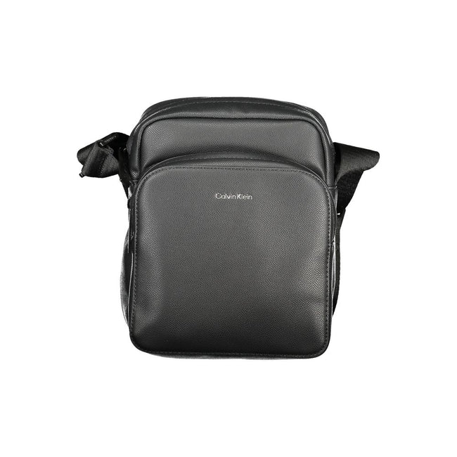Black Polyester Men Shoulder BagElevate your accessory game with the Calvin Klein shoulder bag—a seamless blend of function and style. Flaunting a sleek black hue, this versatile piece features an adjustable strap for personalized comfort, an exterior poc