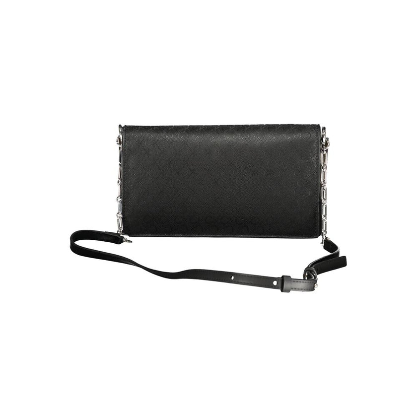 Black Polyester Women HandbagElevate your accessory game with this chic Calvin Klein shoulder bag. Designed to cater to both style and functionality, it flaunts two spacious compartments, a secure central pocket, and a card-formed pocket for your essentia
