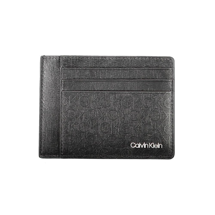 Black Polyester Men WalletElevate your essentials with the sleek sophistication of a Calvin Klein card holder. Designed with the modern man in mind, this card holder boasts functionality with a central pocket and an additional handle holder. The RFID bloc
