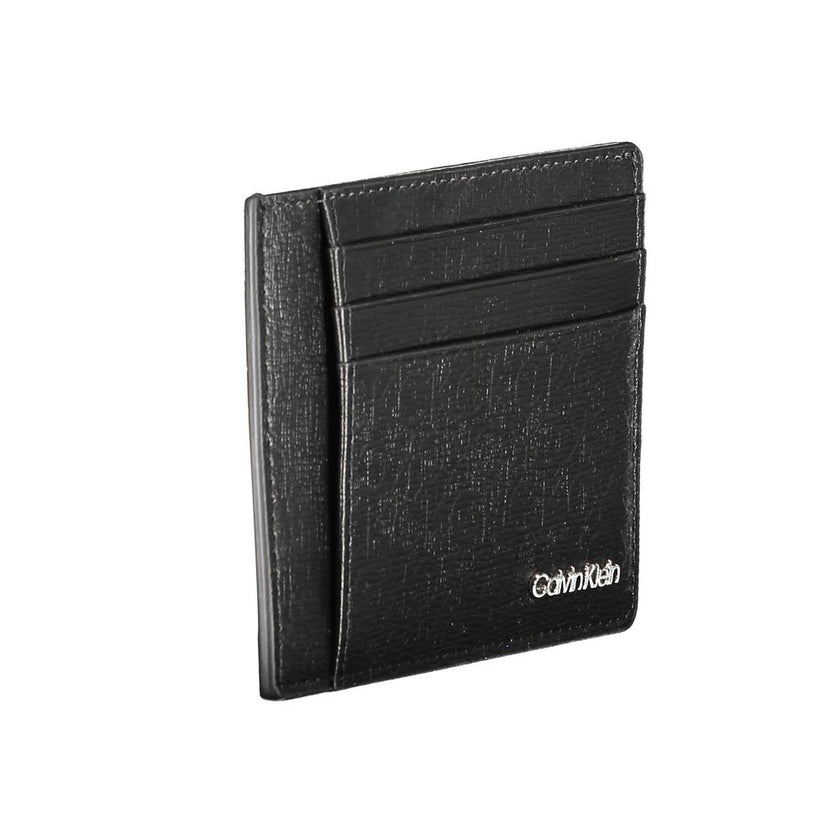 Black Polyester Men WalletElevate your essentials with the sleek sophistication of a Calvin Klein card holder. Designed with the modern man in mind, this card holder boasts functionality with a central pocket and an additional handle holder. The RFID bloc