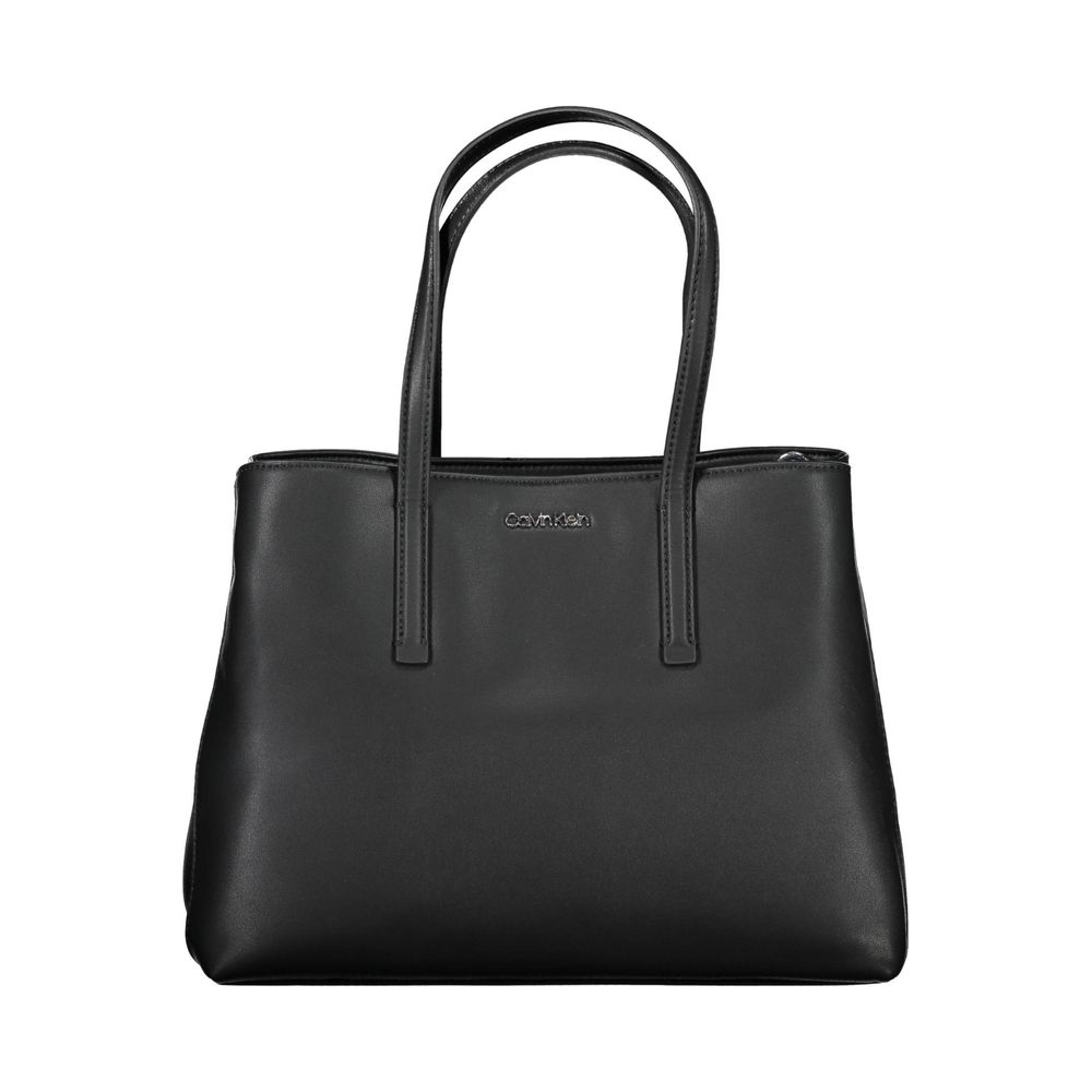 Black Polyester Women HandbagDare to make a statement with the sleek Calvin Klein handbag, designed for the eco-conscious fashionista. Crafted with 100% recycled polyester, it features a versatile dual-handle design complemented by an adjustable and remov