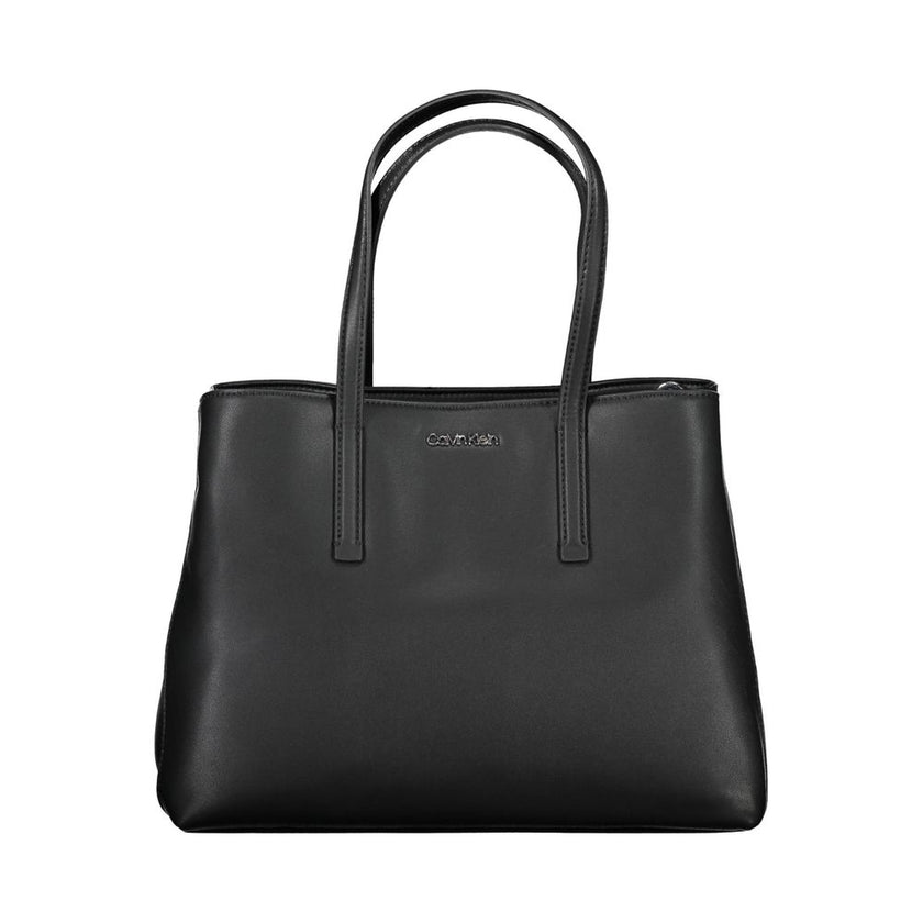 Black Polyester Women HandbagDare to make a statement with the sleek Calvin Klein handbag, designed for the eco-conscious fashionista. Crafted with 100% recycled polyester, it features a versatile dual-handle design complemented by an adjustable and remov