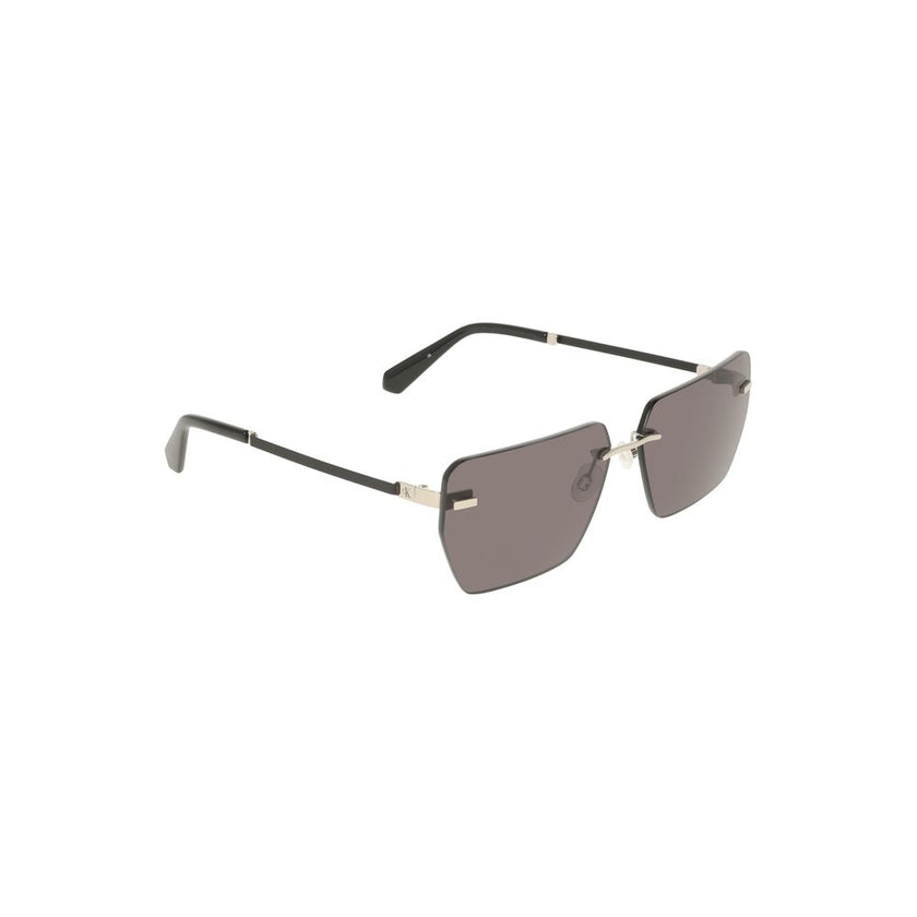 Gray Metal Men SunglassesElevate your style quotient with these sleek Calvin Klein sunglasses. A perfect symphony of design and elegance, these shades boast a bold metal frame that encases smoky square lenses, offering a contemporary twist to your classic
