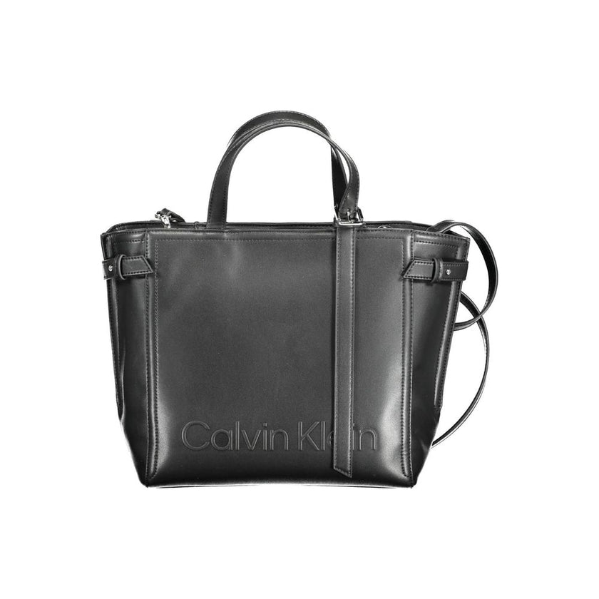 Black Polyester Women HandbagElevate your everyday style with the sophistication of Calvin Klein. This handbag is a testament to sleek aesthetics, featuring a pair of sturdy handles, an adjustable and removable shoulder strap for versatile carrying option
