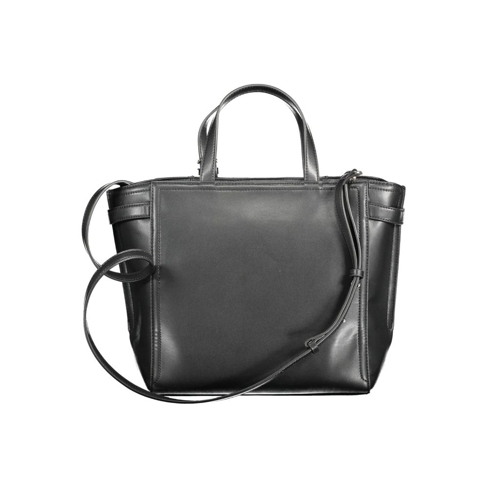 Black Polyester Women HandbagElevate your everyday style with the sophistication of Calvin Klein. This handbag is a testament to sleek aesthetics, featuring a pair of sturdy handles, an adjustable and removable shoulder strap for versatile carrying option