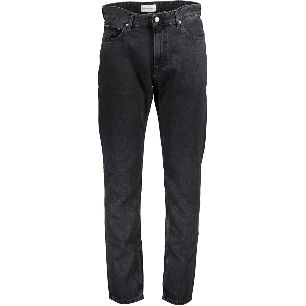 Black Cotton Men JeansElevate your denim collection with the quintessential boldness of Calvin Klein. These dad jeans offer a modern twist on a classic, featuring a washed effect that exudes laid-back sophistication. Crafted from quality materials includi