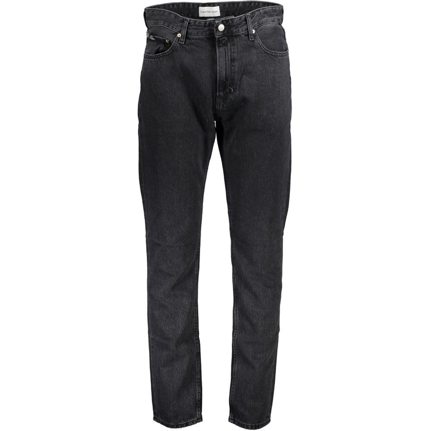 Black Cotton Men JeansElevate your denim collection with the quintessential boldness of Calvin Klein. These dad jeans offer a modern twist on a classic, featuring a washed effect that exudes laid-back sophistication. Crafted from quality materials includi