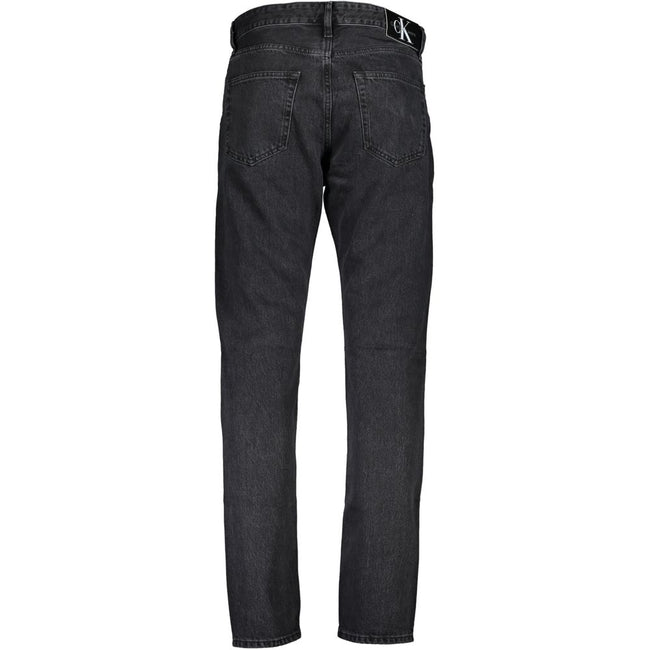 Black Cotton Men JeansElevate your denim collection with the quintessential boldness of Calvin Klein. These dad jeans offer a modern twist on a classic, featuring a washed effect that exudes laid-back sophistication. Crafted from quality materials includi