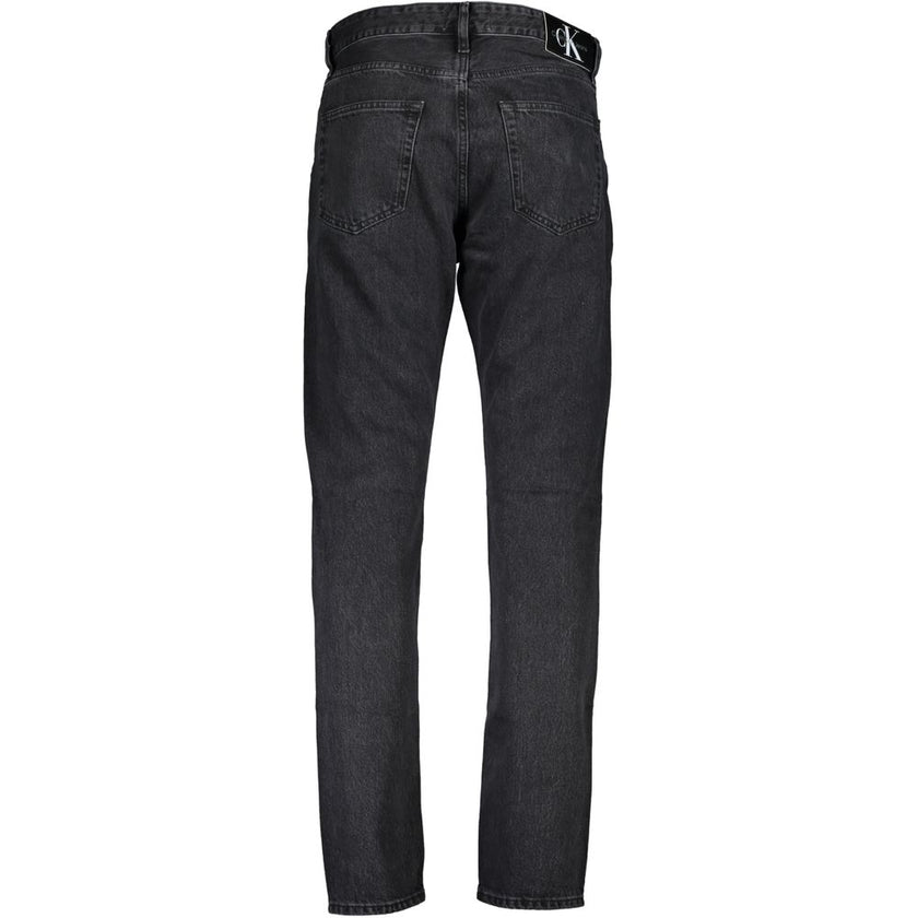Black Cotton Men JeansElevate your denim collection with the quintessential boldness of Calvin Klein. These dad jeans offer a modern twist on a classic, featuring a washed effect that exudes laid-back sophistication. Crafted from quality materials includi