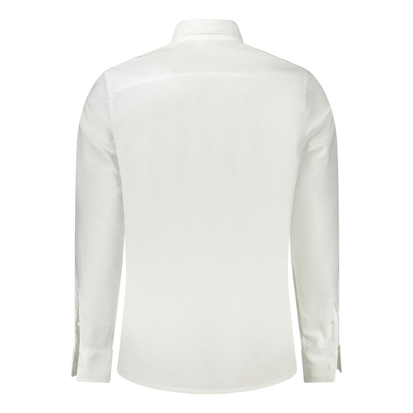 White Cotton Men ShirtElevate your wardrobe with the timeless sophistication of a Calvin Klein long sleeve shirt. Crafted with the finest 100% cotton, this shirt is a testament to classic style and comfort. Sporting an Italian collar and sleek 1-button cu