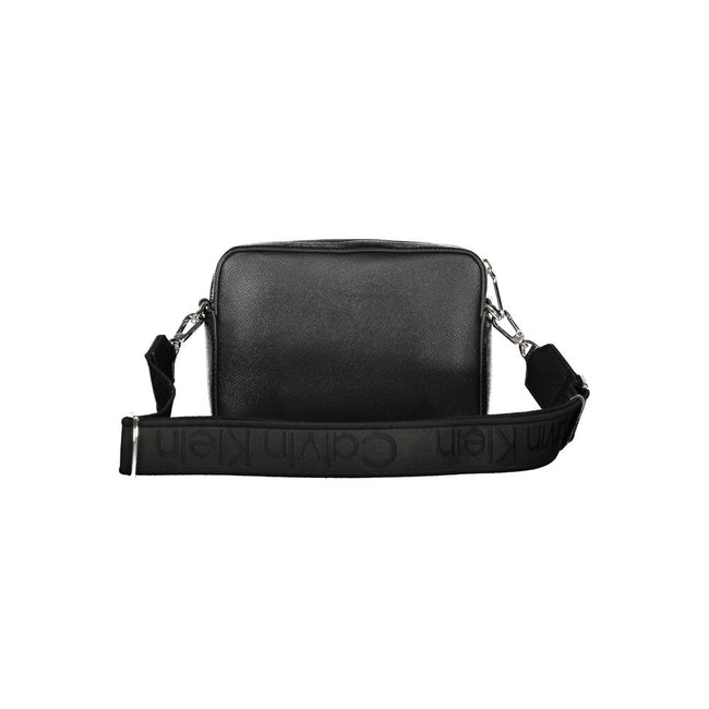 Black Polyethylene Women HandbagElevate your accessory game with this versatile and chic shoulder bag from the iconic Calvin Klein collection. Crafted for the modern fashionista, it features one internal card-formed pocket and a secure zip closure, ensuri
