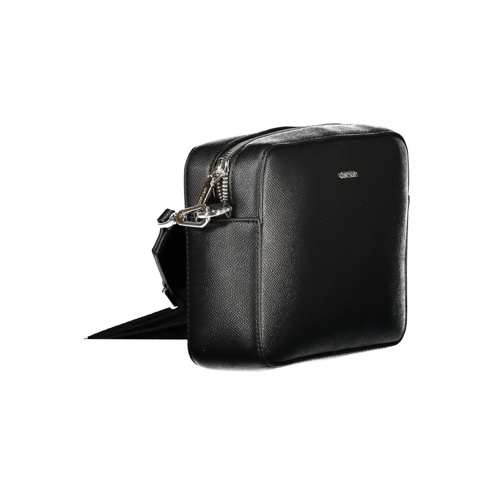 Black Polyethylene Women HandbagElevate your accessory game with this versatile and chic shoulder bag from the iconic Calvin Klein collection. Crafted for the modern fashionista, it features one internal card-formed pocket and a secure zip closure, ensuri
