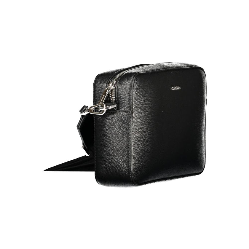 Black Polyethylene Women HandbagElevate your accessory game with this versatile and chic shoulder bag from the iconic Calvin Klein collection. Crafted for the modern fashionista, it features one internal card-formed pocket and a secure zip closure, ensuri