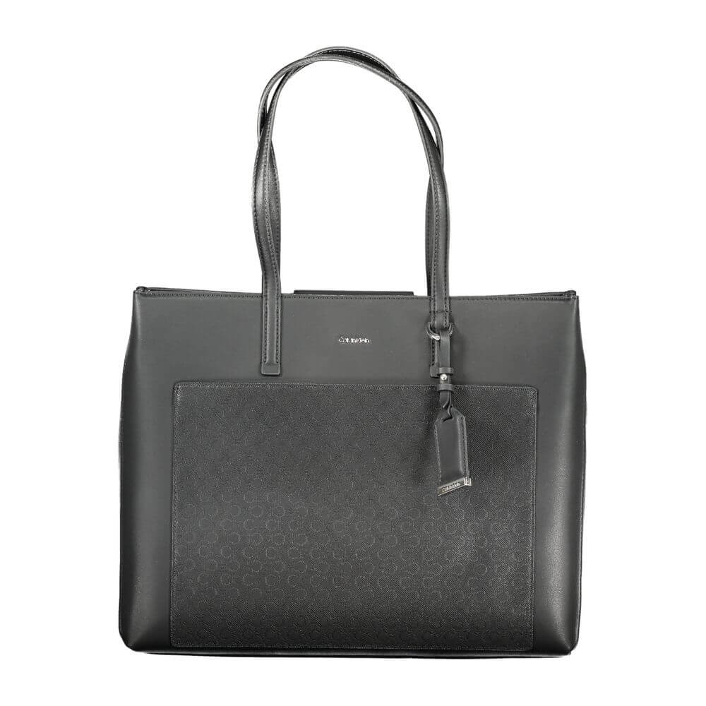 Black Polyester Women HandbagElevate your accessory edit with the exquisite Calvin Klein handbag, a masterpiece of both form and function. It boasts dual shoulder straps for ease of carry, a chic external pocket, and multiple compartments that ensure all