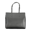 Black Polyester Women HandbagElevate your accessory edit with the exquisite Calvin Klein handbag, a masterpiece of both form and function. It boasts dual shoulder straps for ease of carry, a chic external pocket, and multiple compartments that ensure all