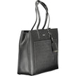Black Polyester Women HandbagElevate your accessory edit with the exquisite Calvin Klein handbag, a masterpiece of both form and function. It boasts dual shoulder straps for ease of carry, a chic external pocket, and multiple compartments that ensure all
