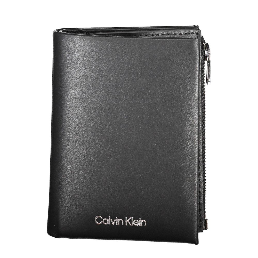 Black Leather Men WalletStep into the epitome of timeless elegance with Calvin Klein’s sleek black wallet. Engineered for both style and security, this accessory boasts a sophisticated leather construction that ensures durability and a luxurious feel. Wit