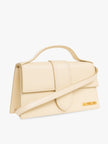 Le Grand Bambino Beige BagJACQUEMUS Gorgeous brand new, 100% Authentic Jacquemus Le Grand Bambino Beige Bag. Model: 213BA007-3060-120 Color: Beige with Gold Hardware Material: Leather Beige with adjustable shoulder strap – Small handle – Removable shoulde