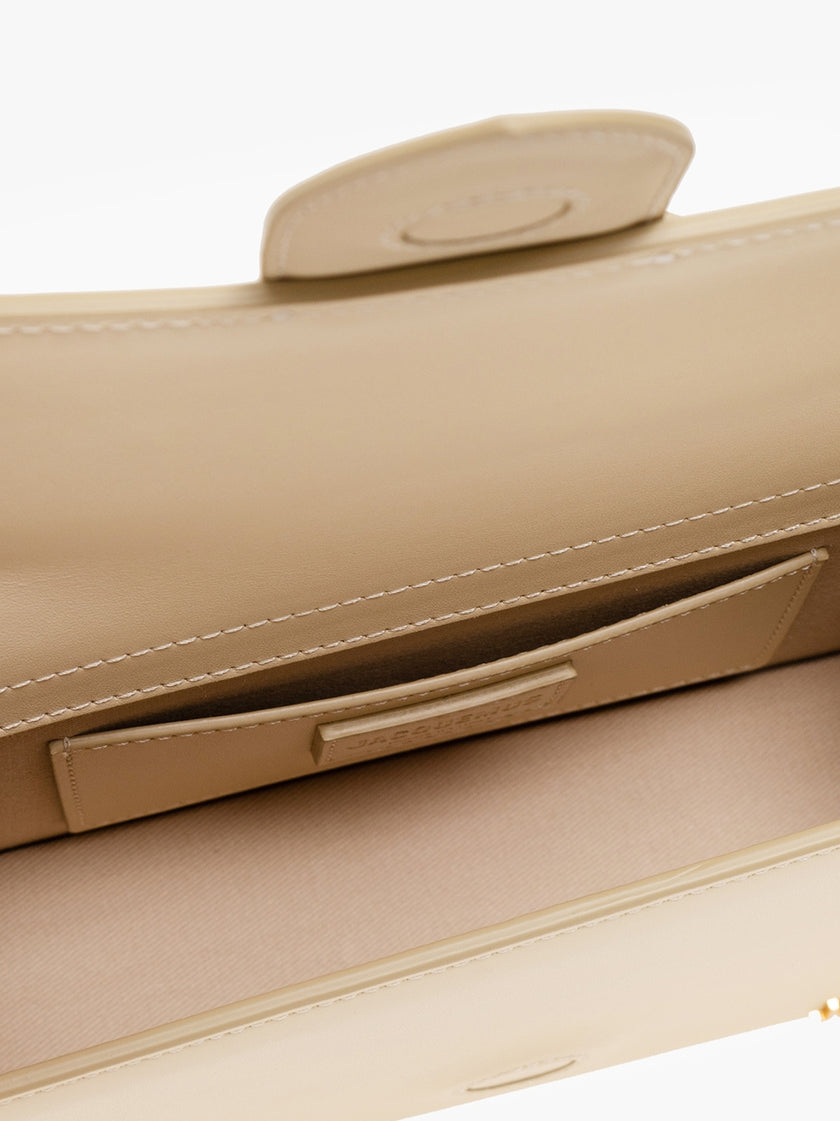 Le Grand Bambino Beige BagJACQUEMUS Gorgeous brand new, 100% Authentic Jacquemus Le Grand Bambino Beige Bag. Model: 213BA007-3060-120 Color: Beige with Gold Hardware Material: Leather Beige with adjustable shoulder strap – Small handle – Removable shoulde