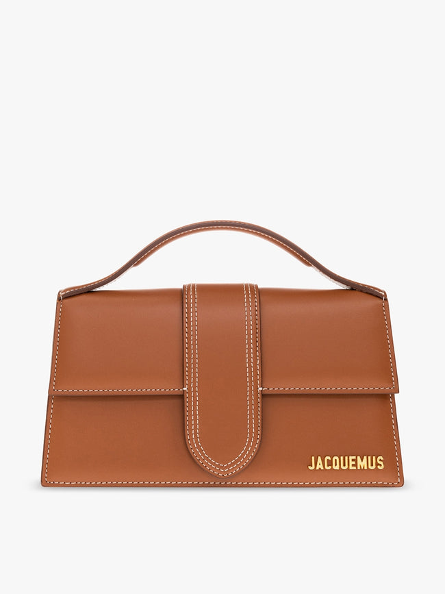 Le Grand Bambino Light Brown BagJACQUEMUS Gorgeous brand new, 100% Authentic Jacquemus Le Grand Bambino light brown Bag. Model: 213BA007-3072-811 Color: Ligt Brown with Gold Hardware Material: Leather – Adjustable shoulder strap – Small handle – Removable