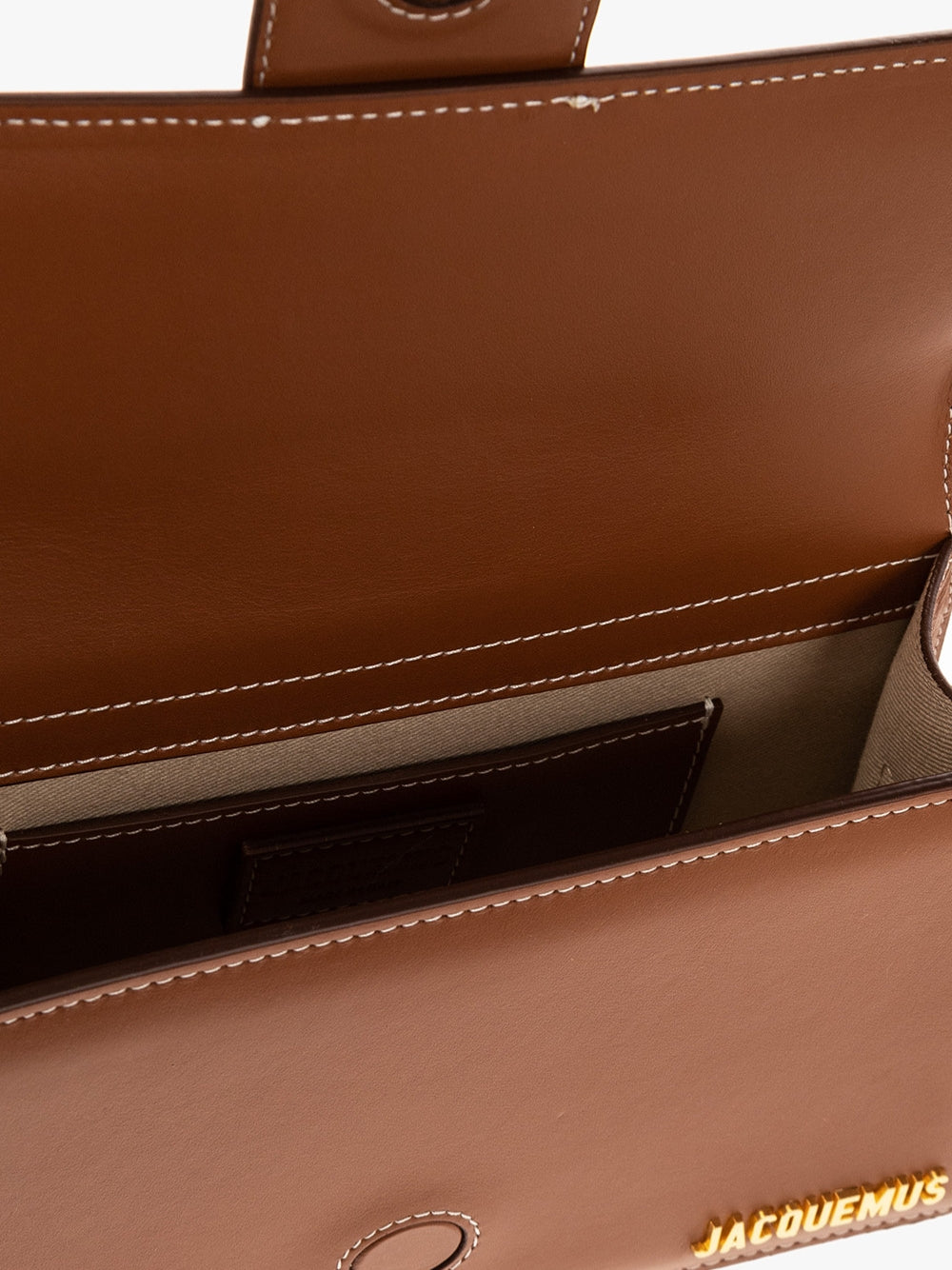 Le Grand Bambino Light Brown BagJACQUEMUS Gorgeous brand new, 100% Authentic Jacquemus Le Grand Bambino light brown Bag. Model: 213BA007-3072-811 Color: Ligt Brown with Gold Hardware Material: Leather – Adjustable shoulder strap – Small handle – Removable