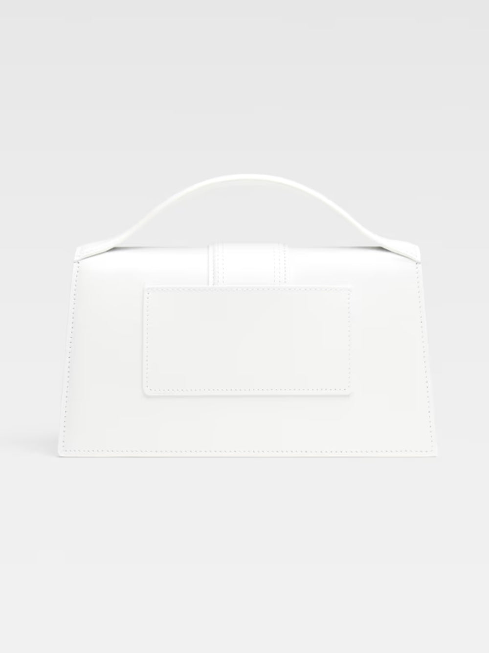 Le Grand Bambino White BagJACQUEMUS Gorgeous brand new, 100% Authentic Jacquemus Le Grand Bambino White Bag. Model: 213BA007-3000-100 Color: White with Gold Hardware Material: Leather – Adjustable shoulder strap – Small handle – Removable shoulder strap –