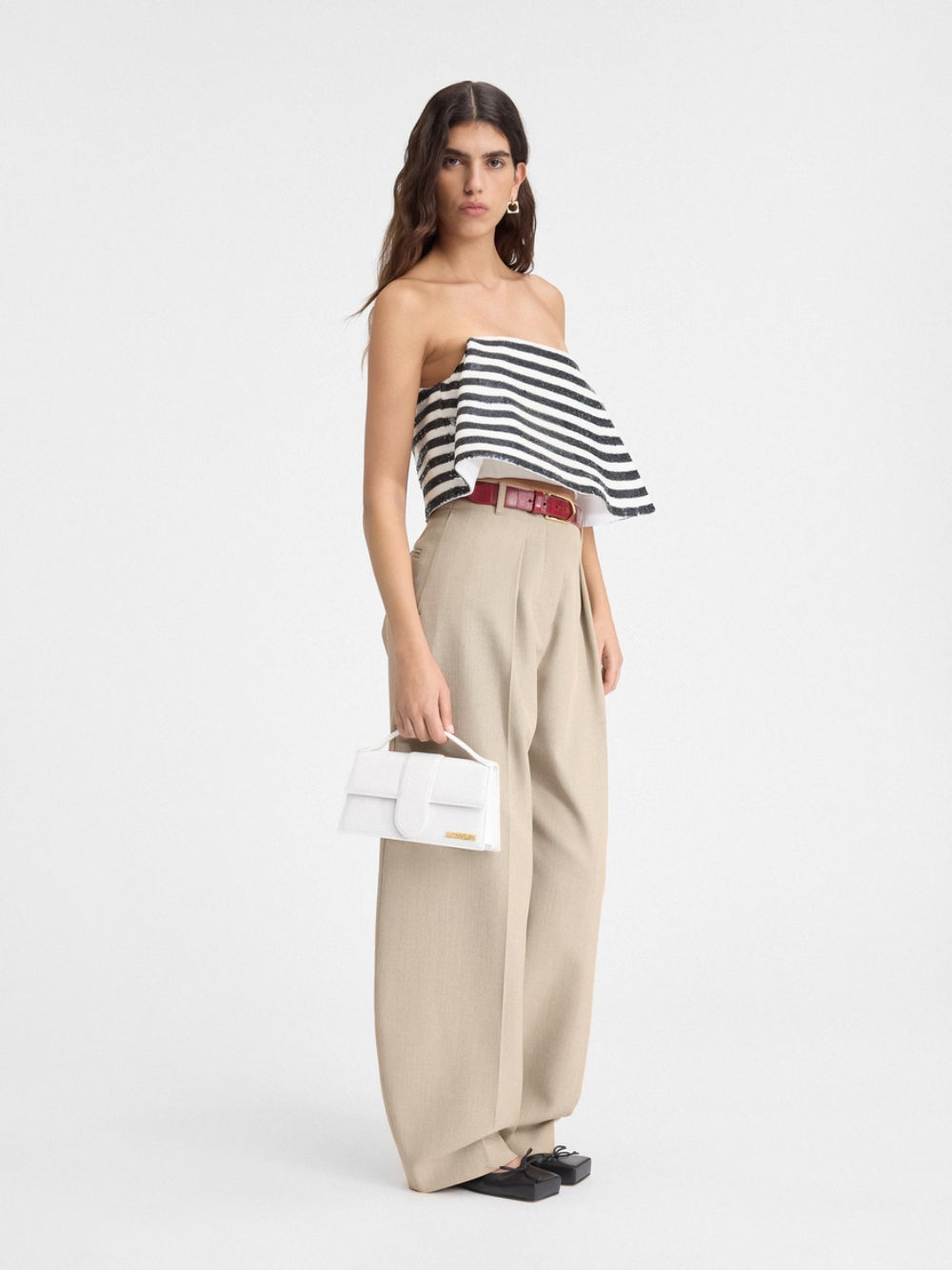 Le Grand Bambino White BagJACQUEMUS Gorgeous brand new, 100% Authentic Jacquemus Le Grand Bambino White Bag. Model: 213BA007-3000-100 Color: White with Gold Hardware Material: Leather – Adjustable shoulder strap – Small handle – Removable shoulder strap –