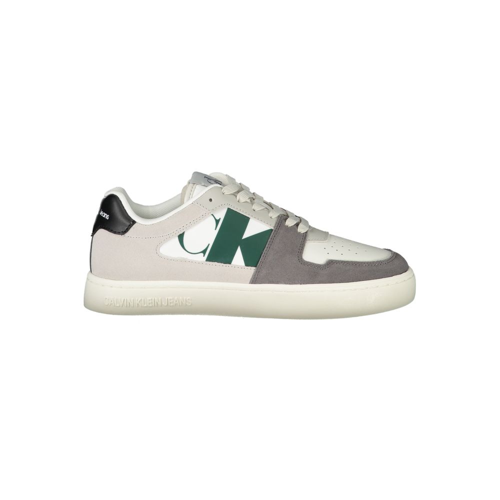 White Polyester Men SneakerStep into the epitome of modern sophistication with the Calvin Klein sports shoe, where functionality meets high-fashion allure. Boasting a bold white base with striking black-green and grey accents, this footwear is a statement