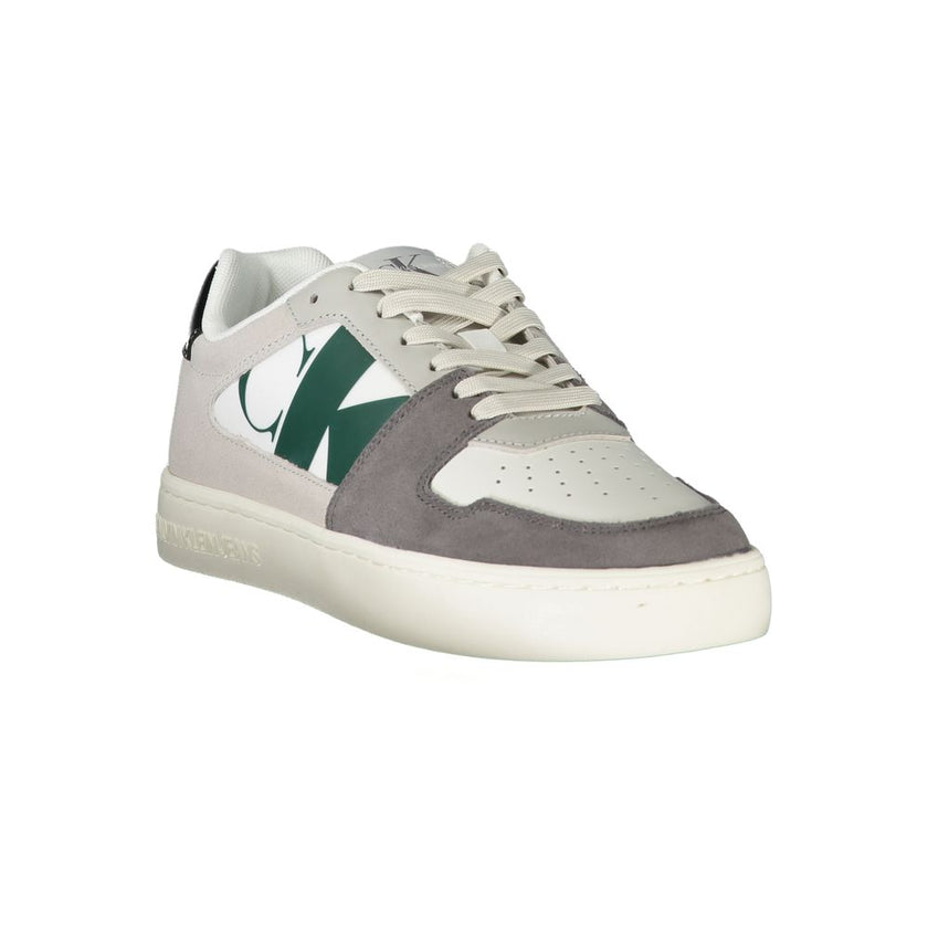 White Polyester Men SneakerStep into the epitome of modern sophistication with the Calvin Klein sports shoe, where functionality meets high-fashion allure. Boasting a bold white base with striking black-green and grey accents, this footwear is a statement