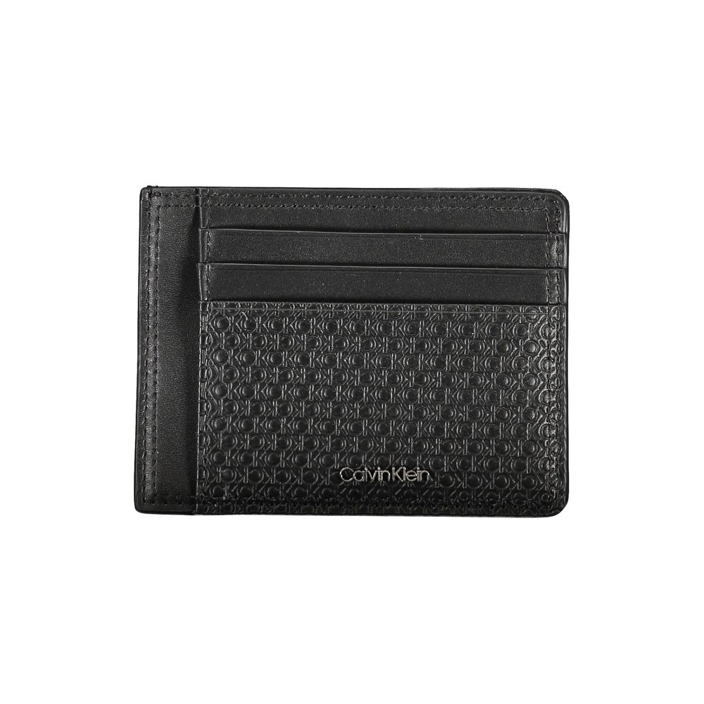 Sleek Black Leather Coin Purse with Card HolderKeep your essentials organized in style with this sophisticated black leather coin purse from Calvin Klein. Perfect for those who appreciate minimalistic elegance paired with functionality. The card holder fe