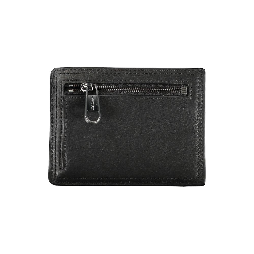 Sleek Black Leather Coin Purse with Card HolderKeep your essentials organized in style with this sophisticated black leather coin purse from Calvin Klein. Perfect for those who appreciate minimalistic elegance paired with functionality. The card holder fe