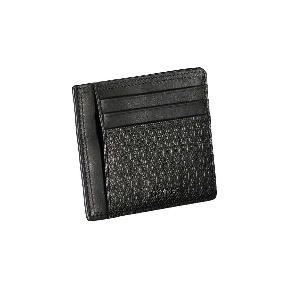 Sleek Black Leather Coin Purse with Card HolderKeep your essentials organized in style with this sophisticated black leather coin purse from Calvin Klein. Perfect for those who appreciate minimalistic elegance paired with functionality. The card holder fe