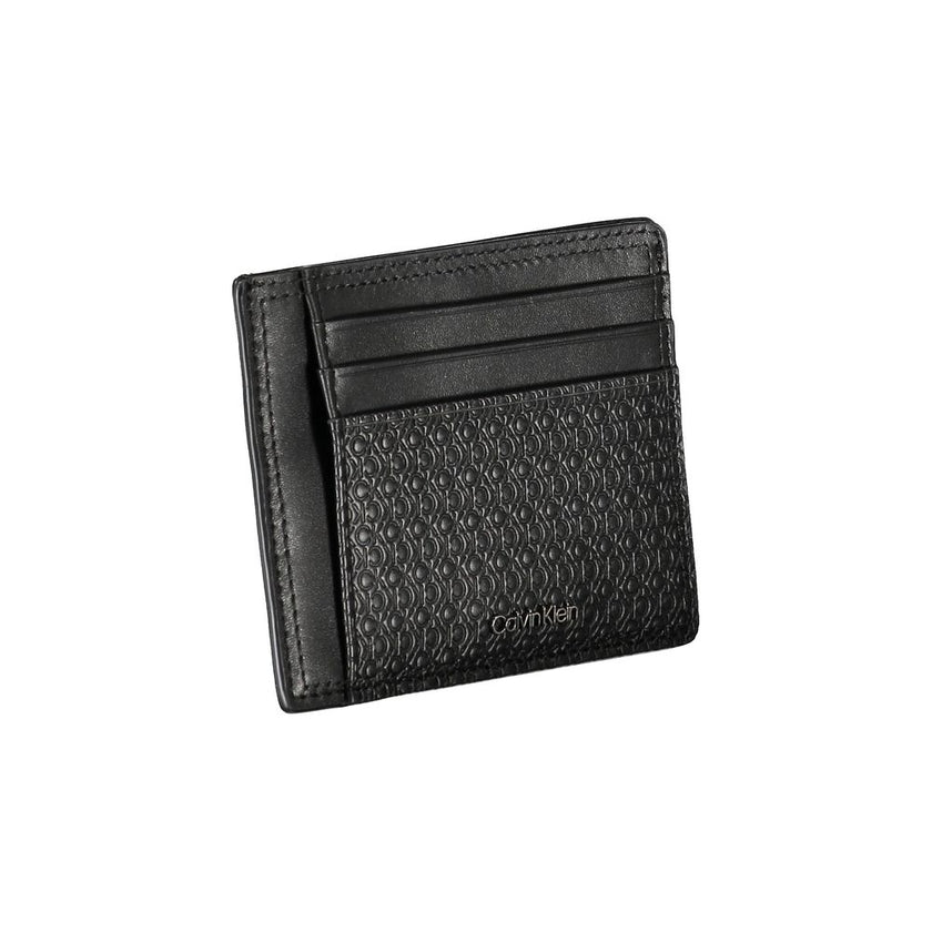 Sleek Black Leather Coin Purse with Card HolderKeep your essentials organized in style with this sophisticated black leather coin purse from Calvin Klein. Perfect for those who appreciate minimalistic elegance paired with functionality. The card holder fe