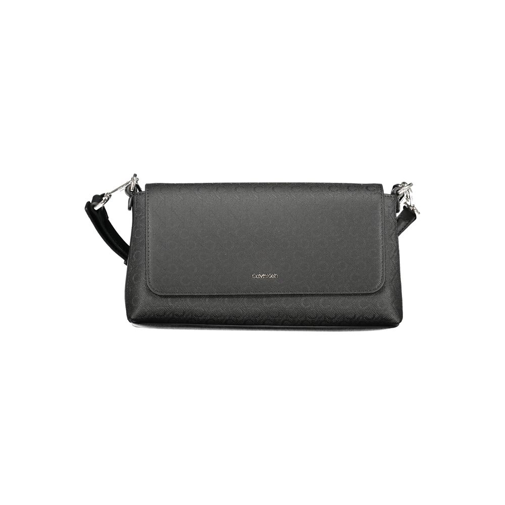 Black Polyester Women HandbagDiscover the epitome of urban elegance with this stunning Calvin Klein handbag, crafted to perfection for the fashion-forward individual. A marvel of form and function, it features a solitary shoulder handle paired with an adj