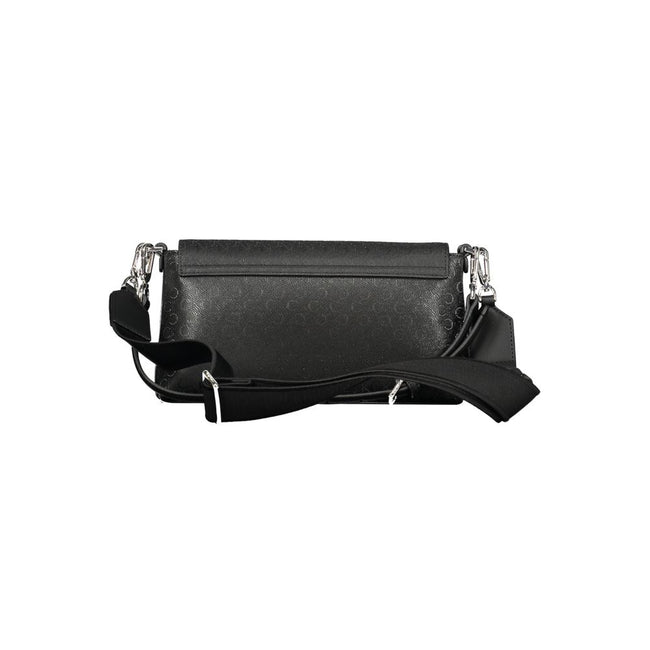 Black Polyester Women HandbagDiscover the epitome of urban elegance with this stunning Calvin Klein handbag, crafted to perfection for the fashion-forward individual. A marvel of form and function, it features a solitary shoulder handle paired with an adj