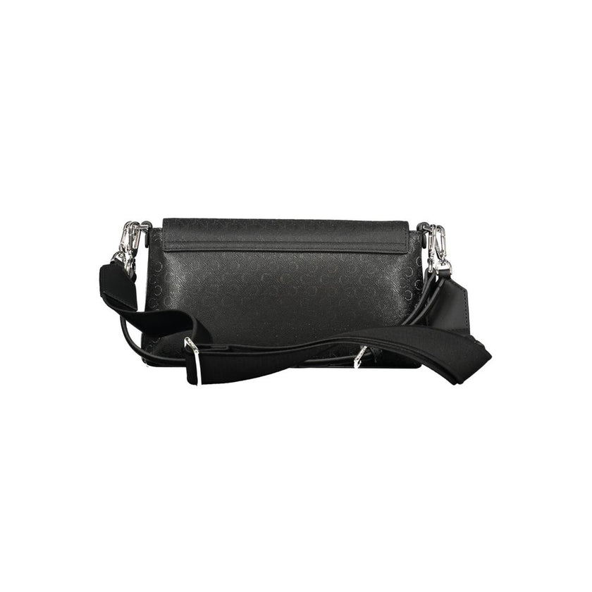 Black Polyester Women HandbagDiscover the epitome of urban elegance with this stunning Calvin Klein handbag, crafted to perfection for the fashion-forward individual. A marvel of form and function, it features a solitary shoulder handle paired with an adj