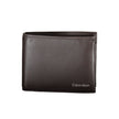Brown Leather Men WalletElevate your essentials with this sleek Calvin Klein wallet, crafted to perfection from 100% leather in a timeless brown hue. With two spacious compartments and a coin purse, it features ample storage for your monetary needs. Sophi