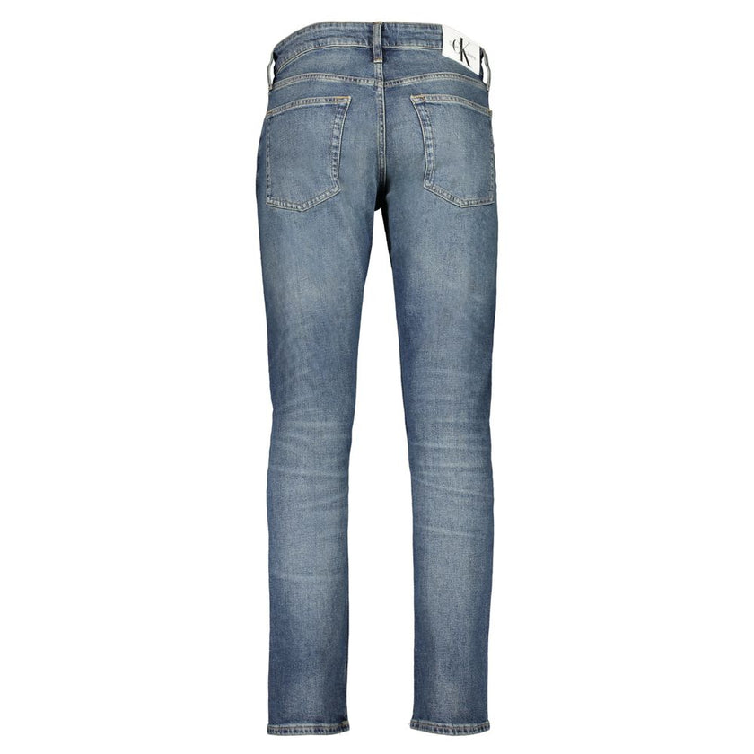 Blue Cotton Men JeansElevate your denim game with the sleek sophistication of Calvin Klein’s slim jeans. A perfect blend of comfort and style, constructed with 20% recycled cotton, these jeans showcase a modern washed effect that makes a bold statement. T