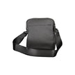 Black Polyester Men Shoulder BagElevate your accessory game with the sleek Calvin Klein Shoulder Bag — where functionality meets minimalist luxury. This piece boasts a sharp black hue enhanced by contrasting details for that touch of edge. Equipped with a